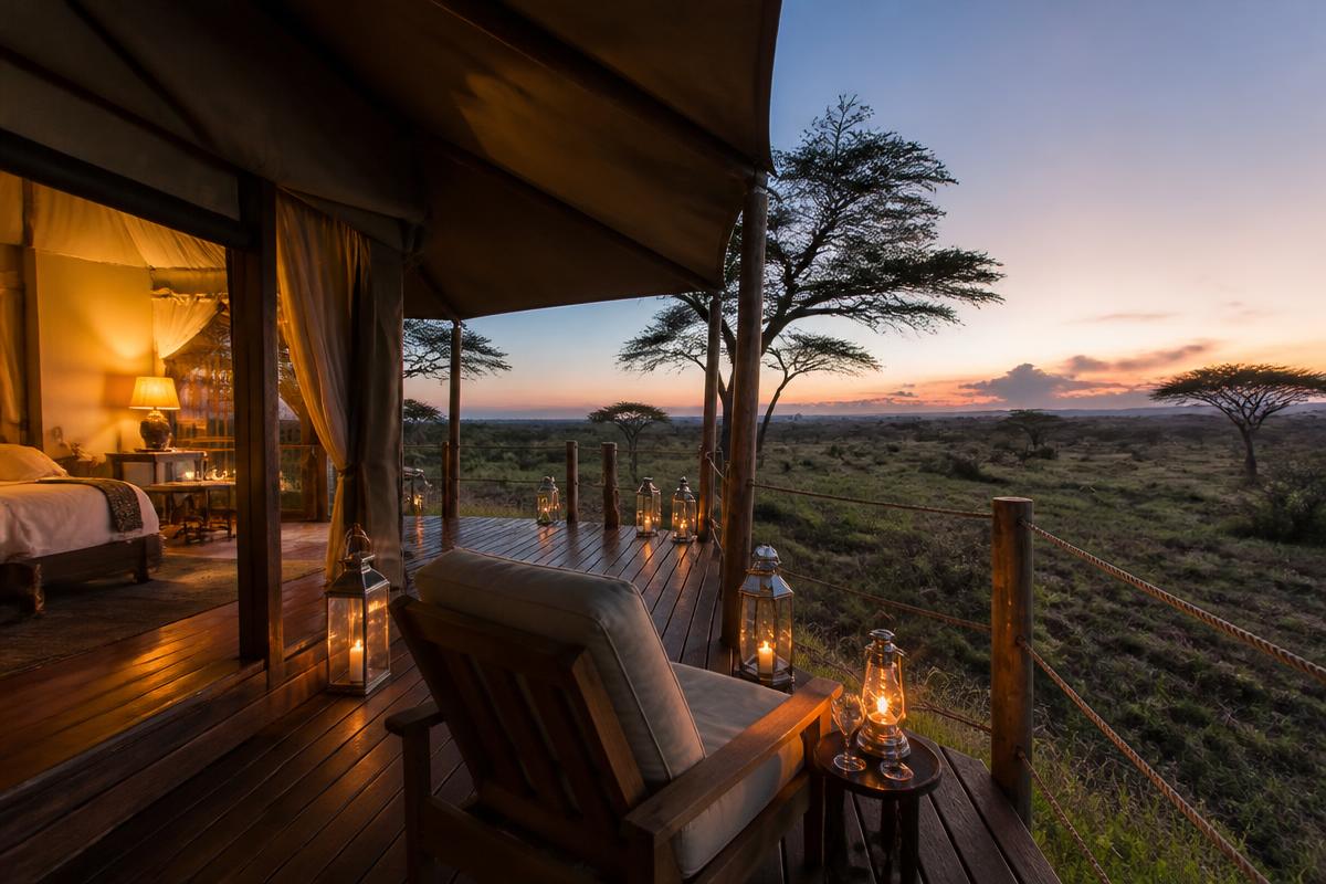 Tented camp overlooking the Serengeti at dusk